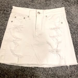 American Eagle Outfitters white ripped jean skirt